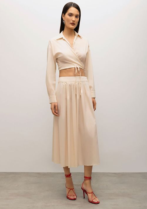 Saia Iódice Midi Evasê Com Pregas Bege